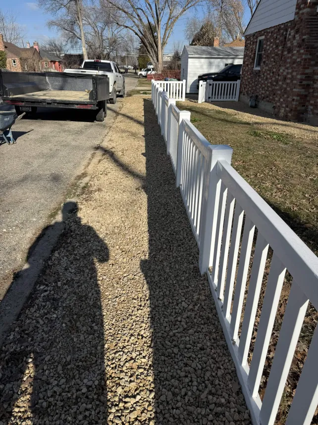 Gravel Drainage Strip Along Fence
